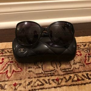 Chanel Black sunglasses with gold arms